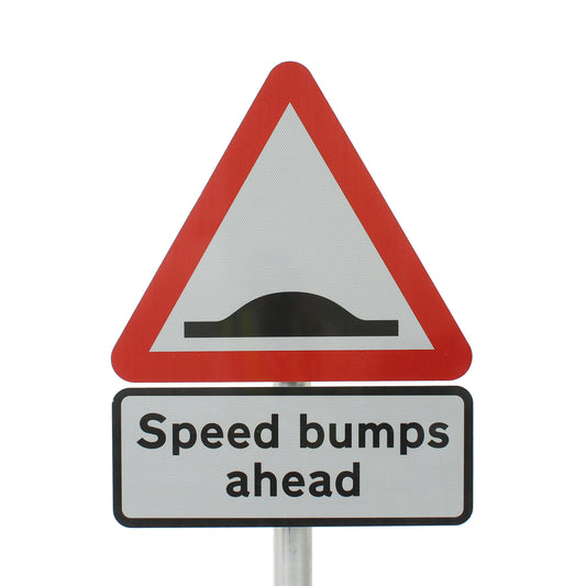 A road sign warning of speed bumps ahead, featuring a red-bordered triangle with a black speed bump symbol above a rectangular white sign that reads 'Speed bumps ahead' in black text.